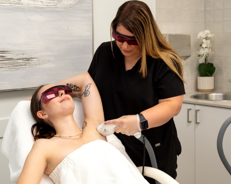 Heights Laser Centre preforming laser hair removal on a patient.